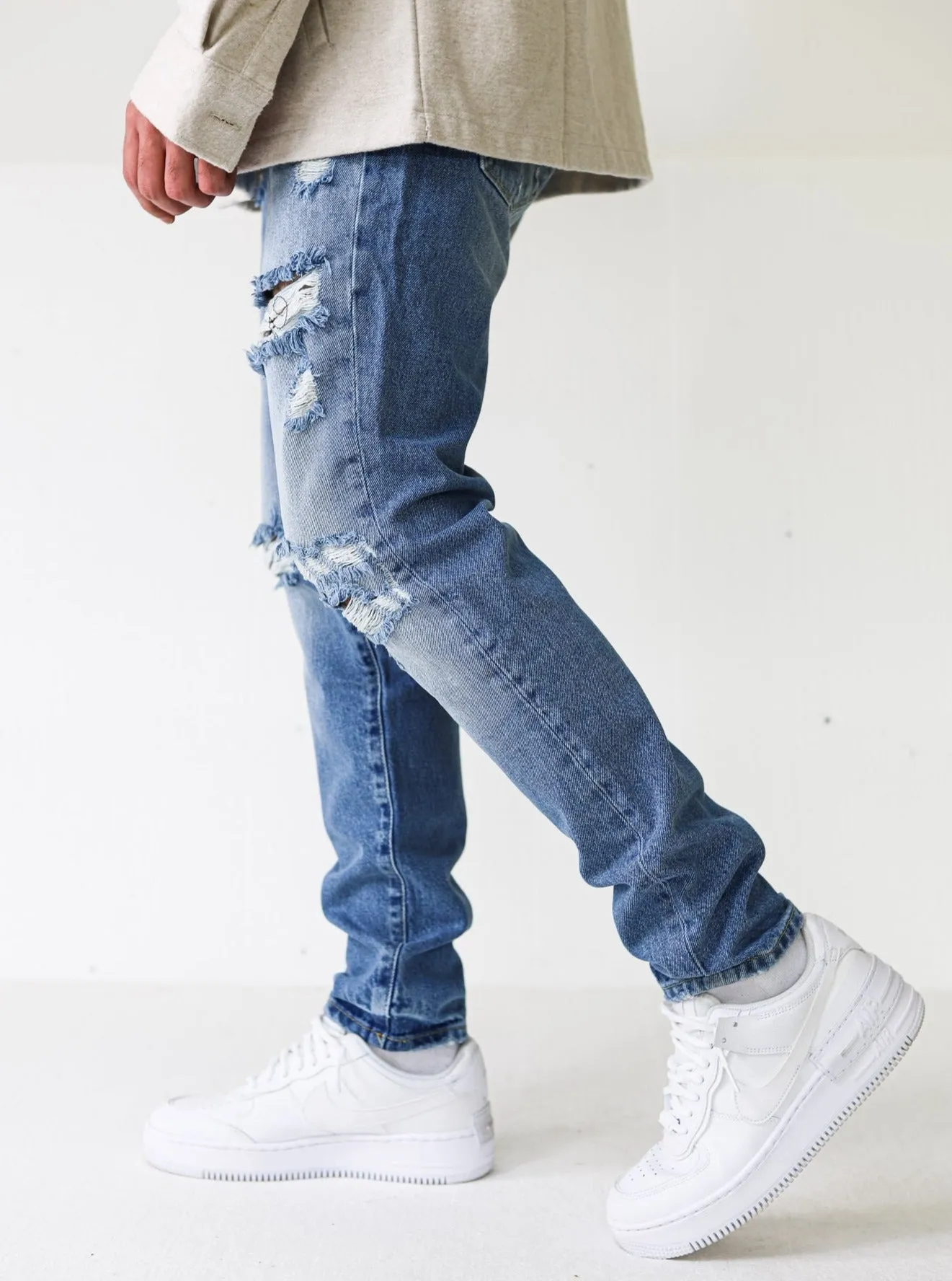 Destroyed Premium Spray On Blue Jeans