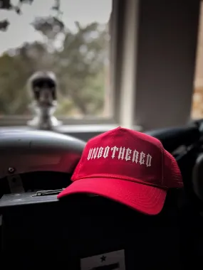 UNBOTHERED CURVED BILL RED HAT